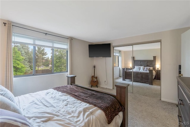 8433 Bubbling Springs Dr, Clay, NY 13027 - carpeted bedroom with multiple windows and a closet