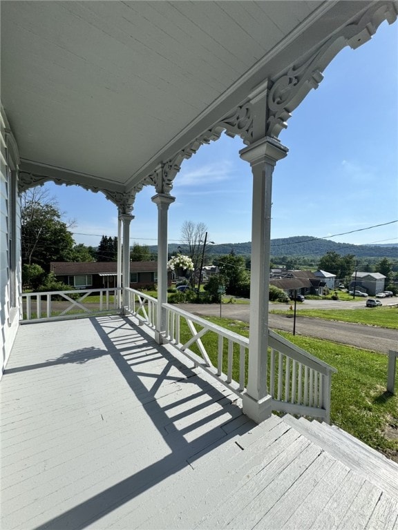 2 2nd St, Eldred, PA 16731 - wooden porch featuring a mountain view