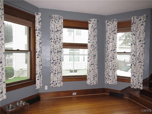 325 Margaret St, Herkimer, NY 13350 - unfurnished room featuring wood finished floors and baseboards