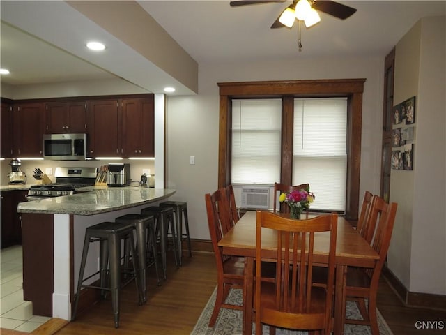 325 Margaret St, Herkimer, NY 13350 - dining room featuring a ceiling fan, light wood finished floors, recessed lighting, and cooling unit