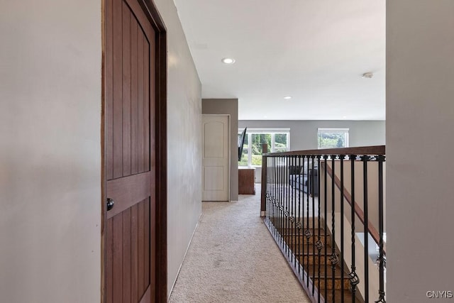 3785 Ransom Rd, Pompey, NY 13078 - corridor with light colored carpet, an upstairs landing, and recessed lighting
