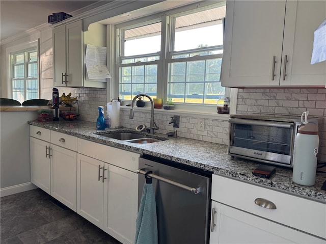 6303 Palmiter Rd, Alfred, NY 14803 - kitchen with stainless steel dishwasher, healthy amount of natural light, backsplash, and white cabinets