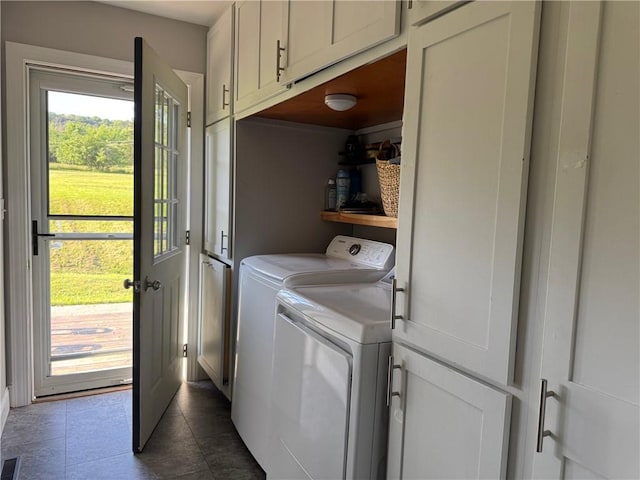 6303 Palmiter Rd, Alfred, NY 14803 - laundry area featuring cabinet space, separate washer and dryer, and dark tile patterned floors