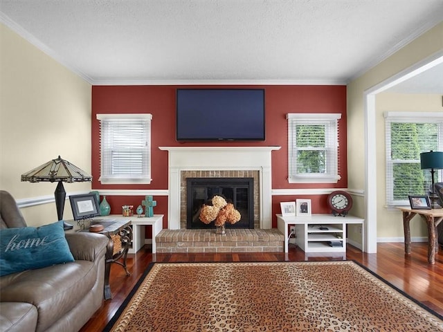 27 Black Spruce Ct, Greece, NY 14616 - living room with wood finished floors, plenty of natural light, ornamental molding, a brick fireplace, and a textured ceiling