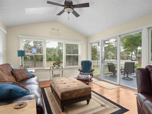 27 Black Spruce Ct, Greece, NY 14616 - living room with lofted ceiling, wood finished floors, and a ceiling fan