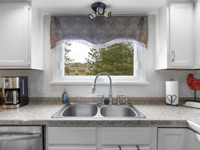 27 Black Spruce Ct, Greece, NY 14616 - kitchen with dishwasher, white cabinets, light countertops, and decorative backsplash