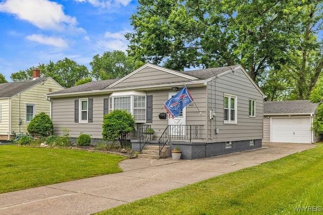503 Kohl St, North Tonawanda, NY 14120 - view of front of home with a front yard, driveway, and a garage