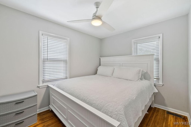 503 Kohl St, North Tonawanda, NY 14120 - bedroom with dark wood-style flooring and ceiling fan
