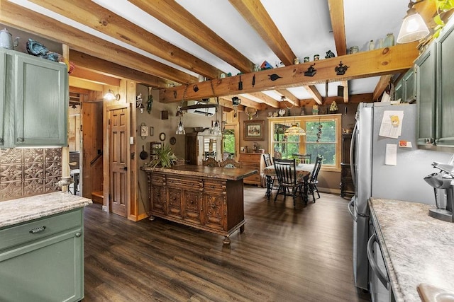 485 Spring Valley Rd, Delhi, NY 13753 - kitchen featuring green cabinets, dark wood-style floors, beamed ceiling, and freestanding refrigerator