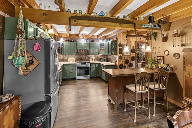 485 Spring Valley Rd, Delhi, NY 13753 - kitchen featuring green cabinets, appliances with stainless steel finishes, dark wood-style flooring, a breakfast bar, and beam ceiling