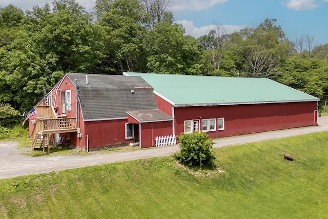485 Spring Valley Rd, Delhi, NY 13753 - view of front facade with a front lawn, stairs, and dirt driveway