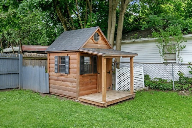 703 N Perry St, Dix, NY 14891 - view of outdoor structure featuring a fenced backyard