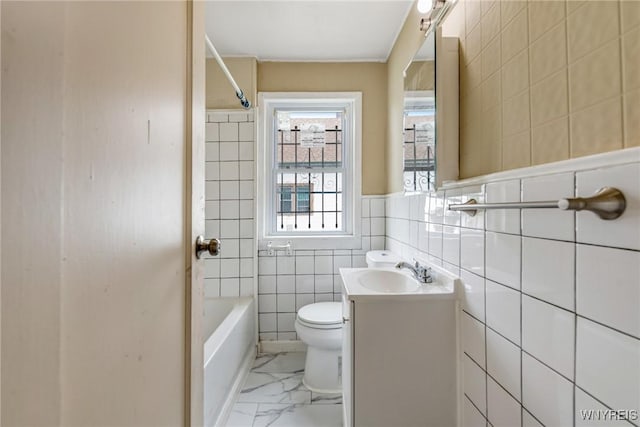 210 Carl St, Buffalo, NY 14215 - bathroom featuring tile walls, vanity, marble look tiles, and shower / bath combination