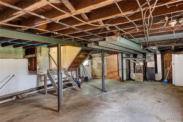 210 Carl St, Buffalo, NY 14215 - unfinished basement with freestanding refrigerator and stairway