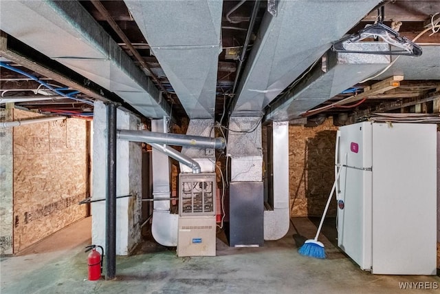 210 Carl St, Buffalo, NY 14215 - unfinished below grade area with freestanding refrigerator