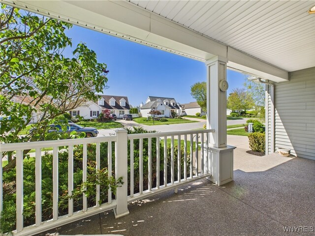 4166 Tisbury Ln, Hamburg, NY 14075 - covered porch featuring a residential view