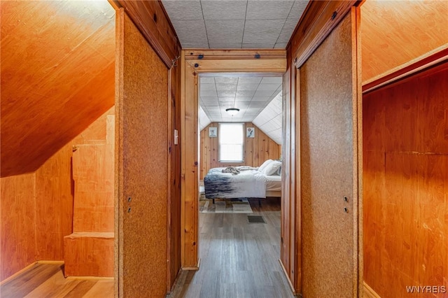 357 Hastings Ave, Buffalo, NY 14215 - hall with wood finished floors, wood walls, and vaulted ceiling
