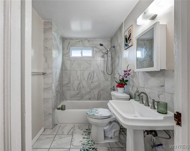 357 Hastings Ave, Buffalo, NY 14215 - bathroom featuring tub / shower combination and marble finish floors