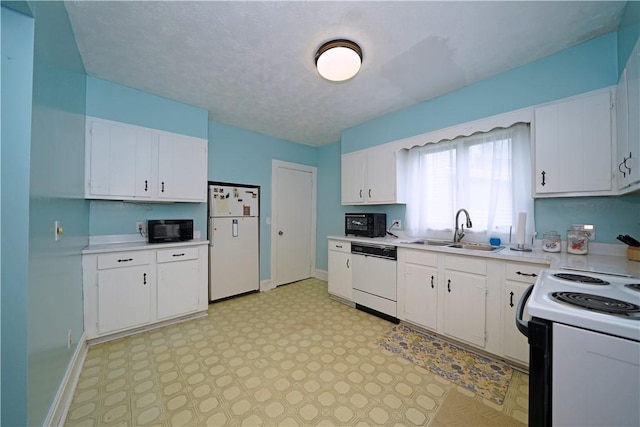 204 E High St, Erwin, NY 14870 - kitchen featuring white appliances, light countertops, white cabinets, and light floors