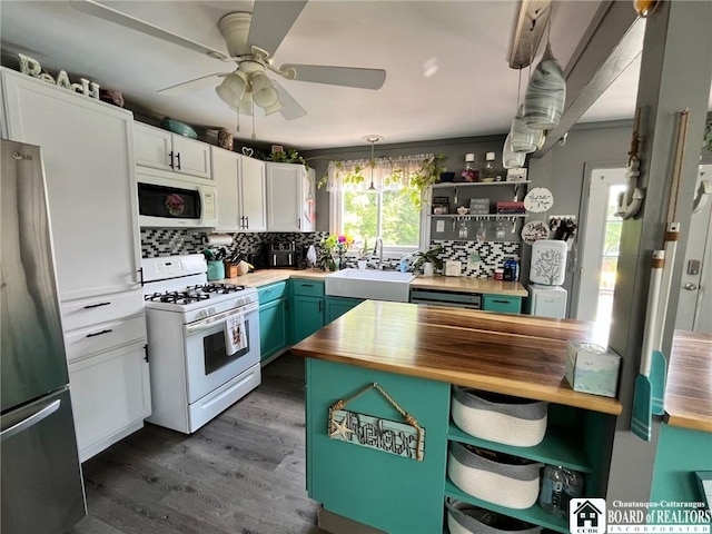 531 Fountain St, Olean-City, NY 14760 - kitchen featuring white appliances, butcher block counters, open shelves, tasteful backsplash, and dark wood-style flooring