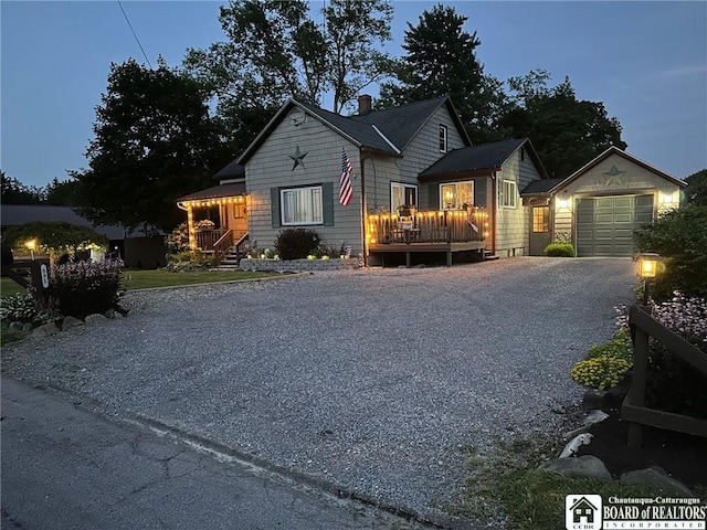 531 Fountain St, Olean-City, NY 14760 - view of front of property featuring a garage, gravel driveway, and an outbuilding