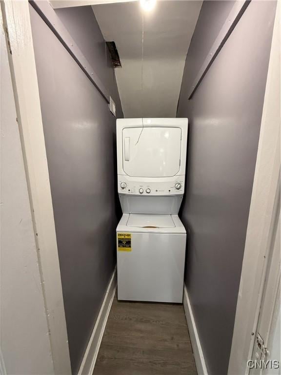 37 Peacock St, Auburn, NY 13021 - laundry room featuring stacked washer and clothes dryer and wood finished floors