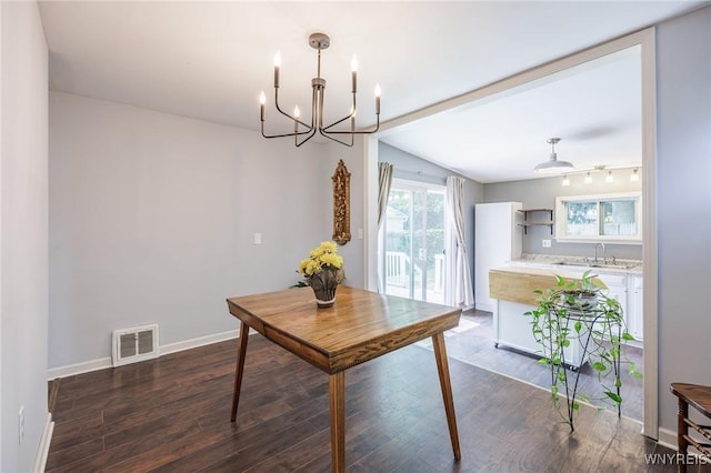 39 Marwood Rd, Greece, NY 14616 - dining space with a chandelier, wood finished floors, and plenty of natural light