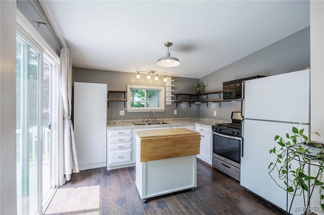 39 Marwood Rd, Greece, NY 14616 - kitchen featuring freestanding refrigerator, open shelves, stainless steel range with gas cooktop, butcher block counters, and white cabinetry