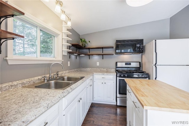 39 Marwood Rd, Greece, NY 14616 - kitchen with stainless steel range with gas stovetop, black microwave, wood counters, open shelves, and dark wood-style floors