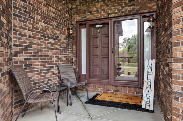 2160 Robert Dr, Niagara, NY 14304 - doorway to property featuring brick siding