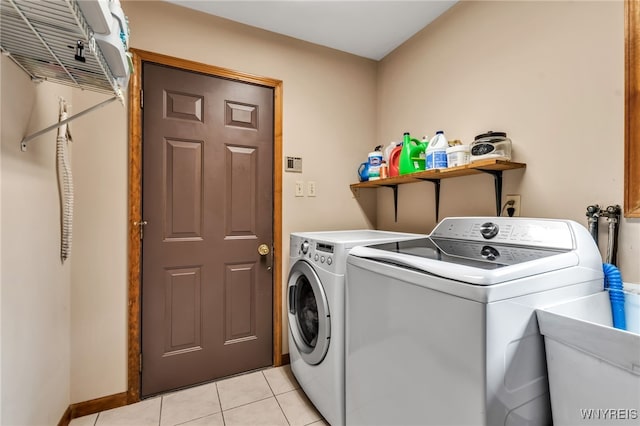 2160 Robert Dr, Niagara, NY 14304 - washroom with washing machine and dryer and light tile patterned floors