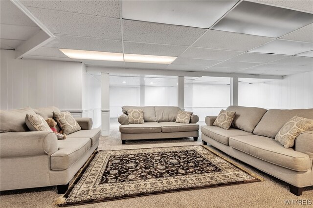 2160 Robert Dr, Niagara, NY 14304 - living room with carpet, a paneled ceiling, and a decorative wall