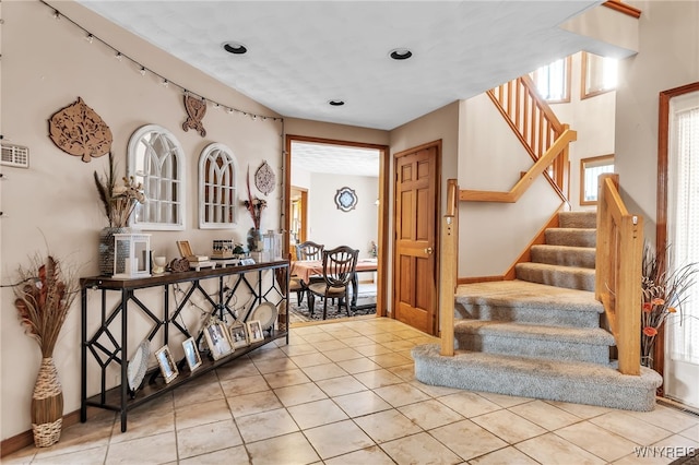 2160 Robert Dr, Niagara, NY 14304 - foyer entrance with stairs and tile patterned floors