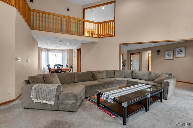 2160 Robert Dr, Niagara, NY 14304 - carpeted living room with a high ceiling and recessed lighting