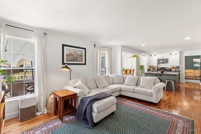 5418 Quamby Rd, Clay, NY 13041 - living area featuring light wood-style floors, healthy amount of natural light, and recessed lighting
