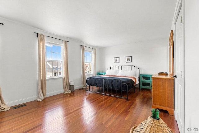 5418 Quamby Rd, Clay, NY 13041 - bedroom featuring hardwood / wood-style flooring and baseboards