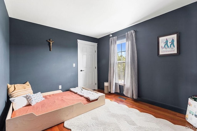 5418 Quamby Rd, Clay, NY 13041 - bedroom with wood finished floors and baseboards