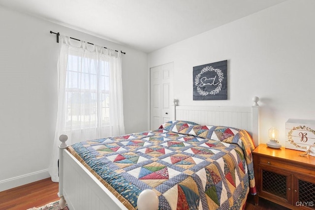 5418 Quamby Rd, Clay, NY 13041 - bedroom with wood finished floors and baseboards