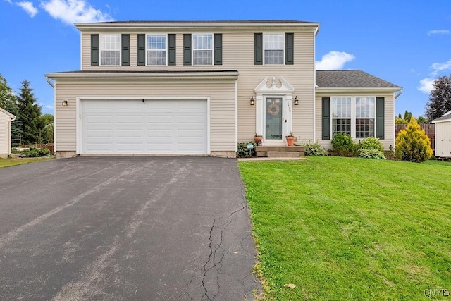 5418 Quamby Rd, Clay, NY 13041 - view of front of home featuring asphalt driveway, an attached garage, and a front yard