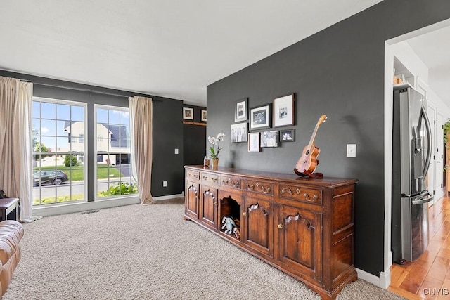 5418 Quamby Rd, Clay, NY 13041 - living area with baseboards and light colored carpet