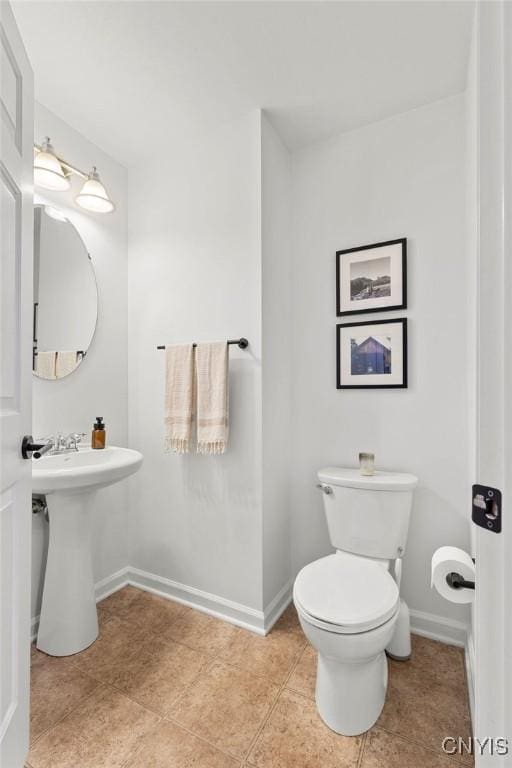 5418 Quamby Rd, Clay, NY 13041 - half bath featuring toilet and baseboards