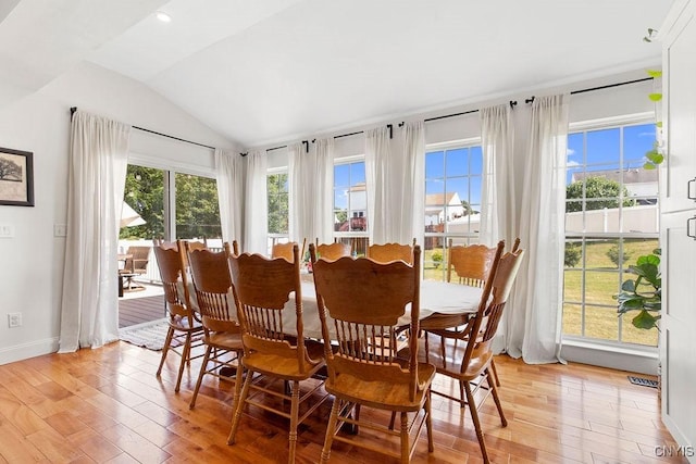 5418 Quamby Rd, Clay, NY 13041 - dining space with lofted ceiling, light wood-style floors, and recessed lighting