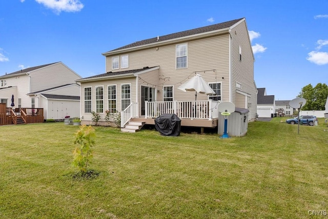 5418 Quamby Rd, Clay, NY 13041 - rear view of house with a deck and a yard