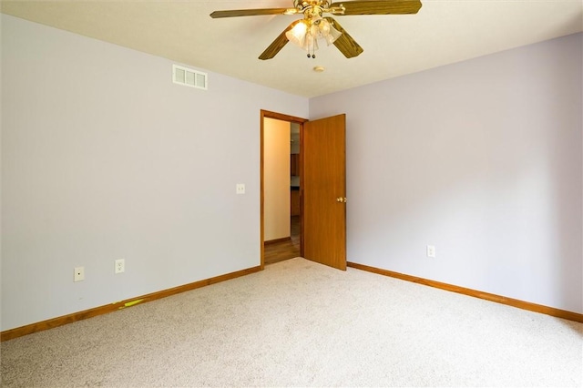 282 Troup St, Rochester, NY 14608 - spare room featuring light colored carpet and a ceiling fan