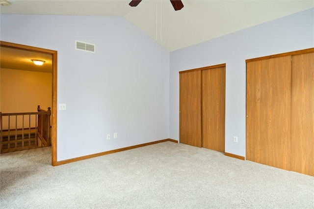 282 Troup St, Rochester, NY 14608 - unfurnished bedroom with carpet, lofted ceiling, multiple closets, and ceiling fan
