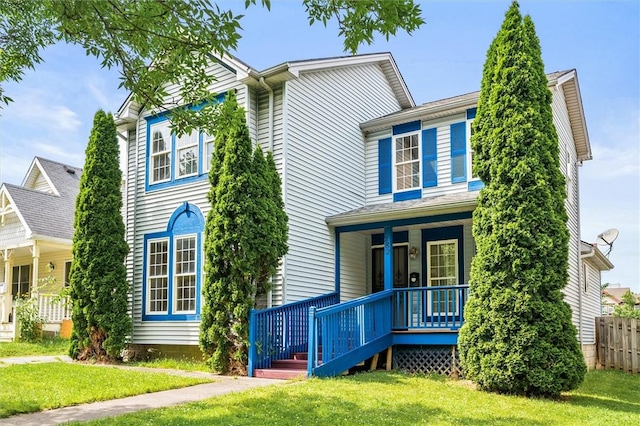 282 Troup St, Rochester, NY 14608 - traditional-style house featuring a porch and a front lawn