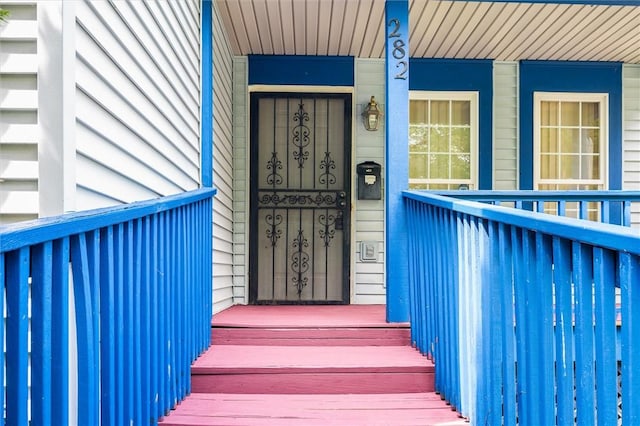 282 Troup St, Rochester, NY 14608 - doorway to property with a porch
