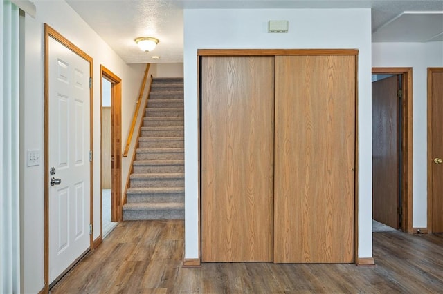 282 Troup St, Rochester, NY 14608 - foyer entrance featuring wood finished floors and stairway