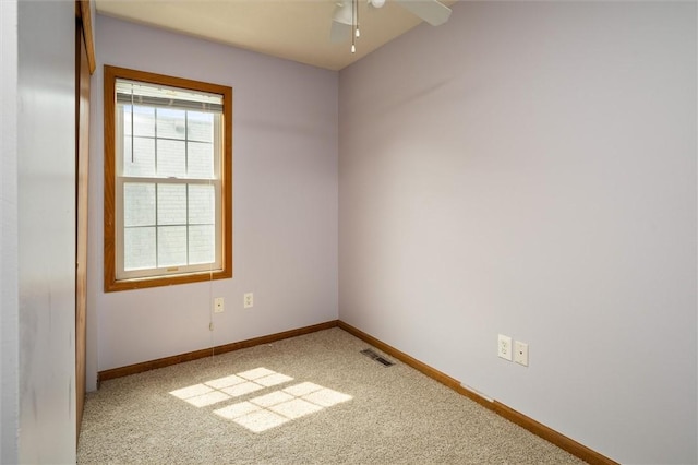 282 Troup St, Rochester, NY 14608 - carpeted spare room with baseboards and a ceiling fan