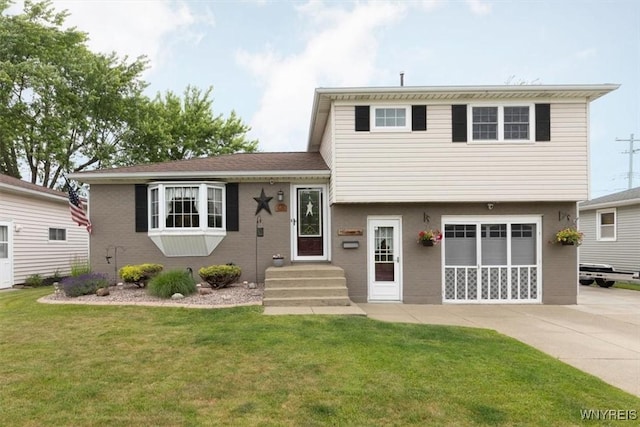 68 Dover Dr, West Seneca, NY 14224 - split level home featuring driveway, a front lawn, an attached garage, entry steps, and brick siding